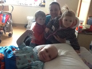 zachary with anne and the other kids after his surgery